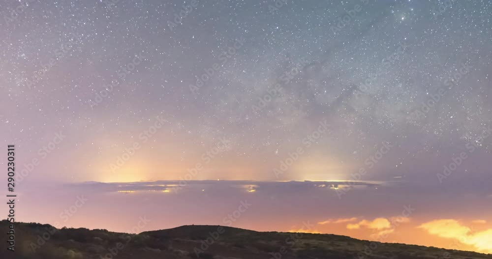 Timelapse of the milky way rising over Gran Canaria Island, Canary Islands. Long exposure shot at night showing ther milky way rising over the Island of Gran Canaria. Shoot from Tenerife. Timelapse of the milky way rising over Gran Canaria Island, Canary Islands. Long exposure shot at night showing ther milky way rising over the Island of Gran Canaria. Shoot from Tenerife.