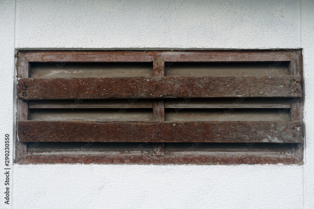 Old rustic wood window on the wall. Old rustic wood window on the wall.