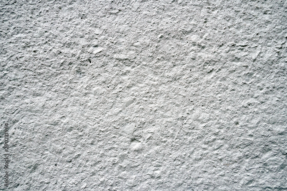 White rough concrete wall texture background.