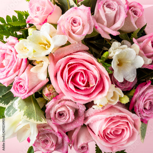 Beautiful and tender bouquet of flowers in the hat box 