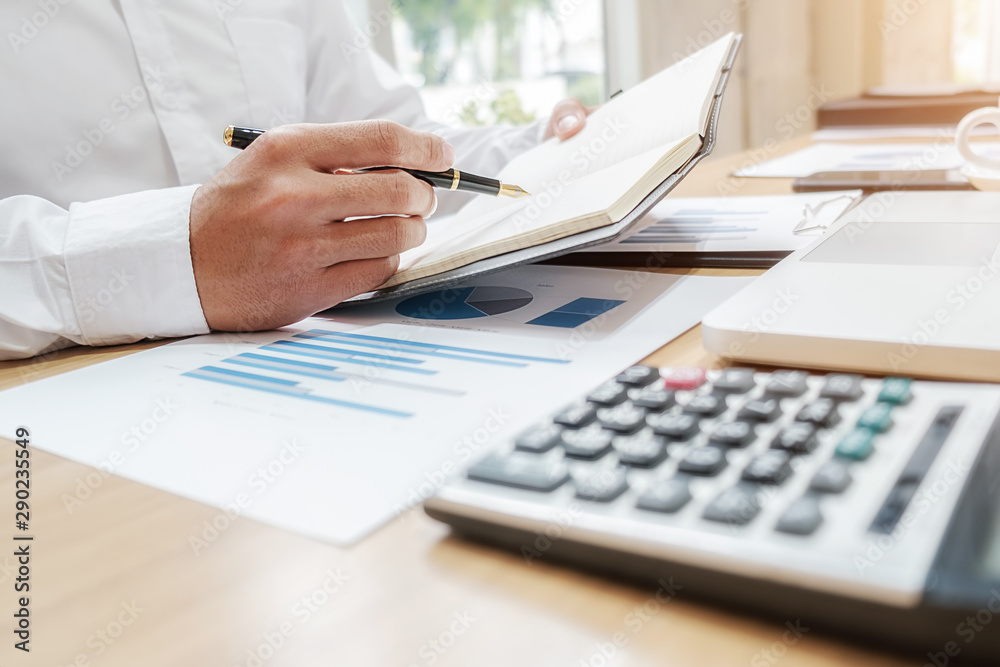 Business team brainstorming and discussing with financial data and report graph. Teamwork meeting working concept. Business team brainstorming and discussing with financial data and report graph. Teamwork meeting working concept.