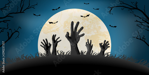 Halloween zombie hand in front of full moon