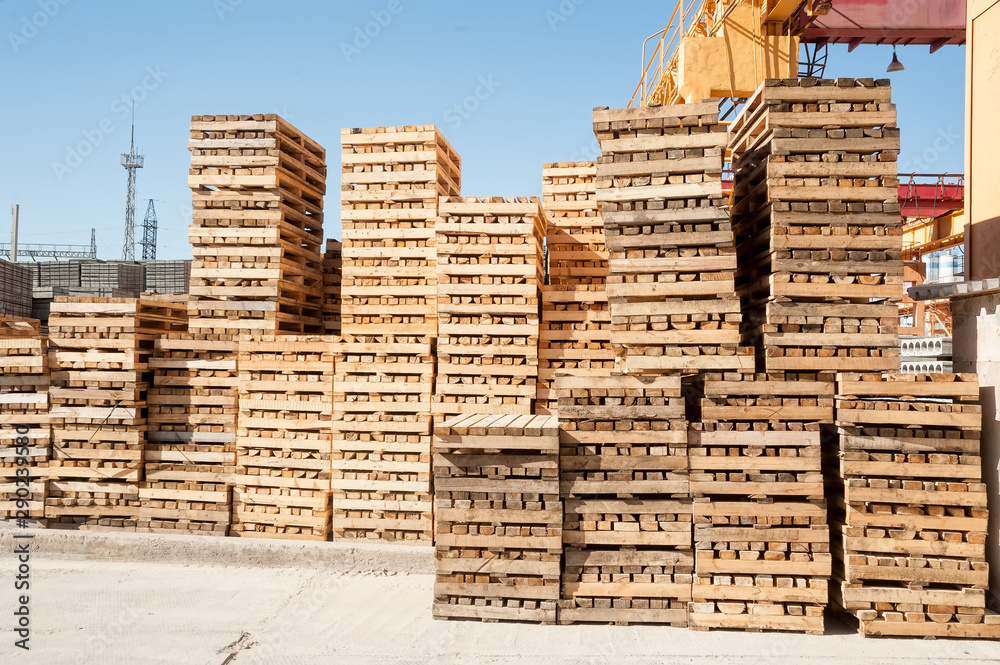 Empty wooden pallets for industrial transportation Empty wooden pallets for industrial transportation