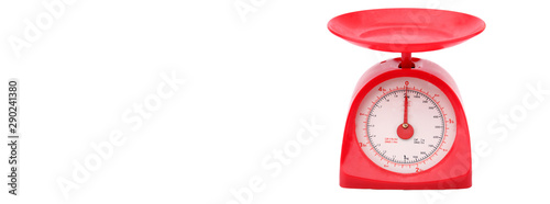 Red kitchen scales isolate on white background with clipping path.