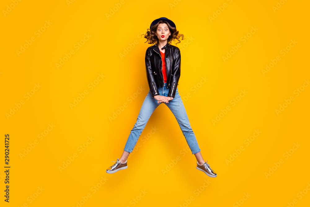 Full size photo of comic humor girl jump enjoy free time holiday wear denim jeans isolated over yellow color background