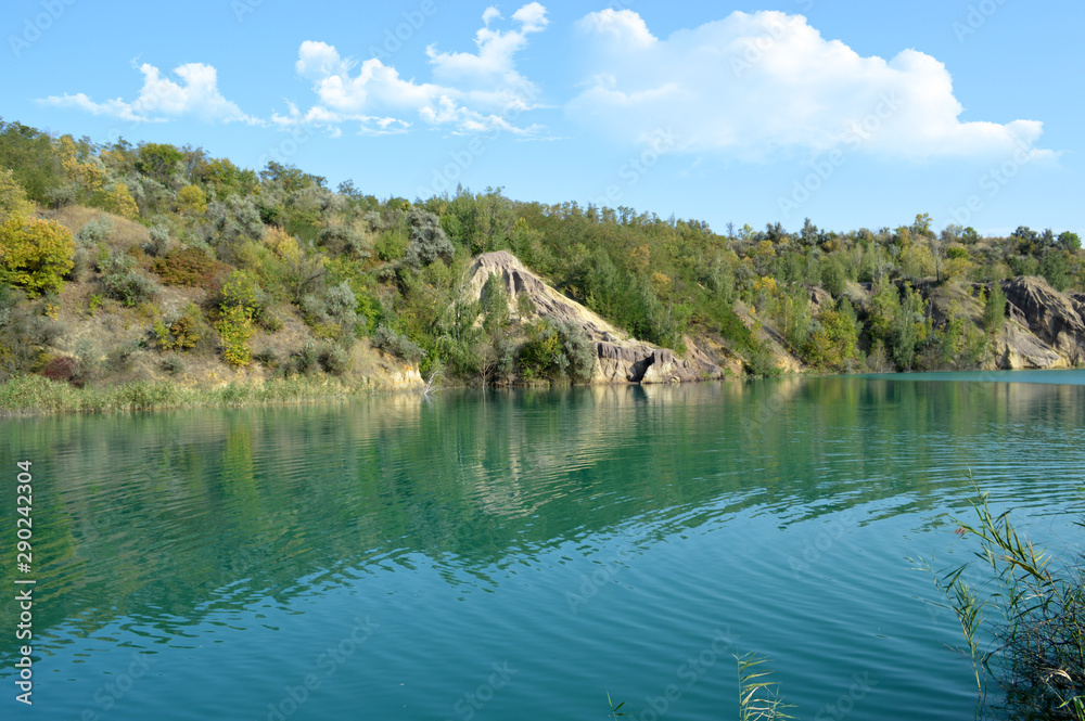 Fototapeta premium landscape on the water with a steep coast