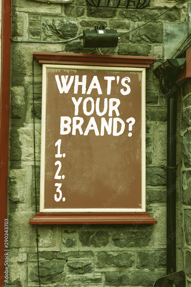 Conceptual hand writing showing What S Your Brand Question. Concept meaning asking about product logo does or what you communicate Blank board copy space for commercial advertising on wall