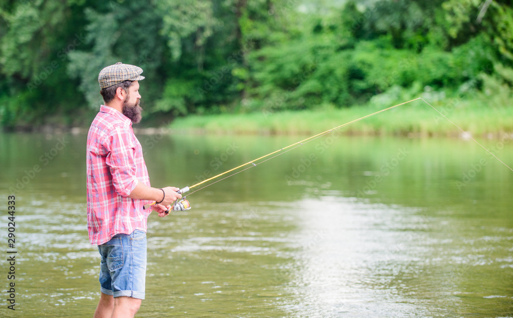 big size. Successful fly fishing. summer weekend. man catching fish. mature man fly fishing. sport activity and hobby. experienced fisher in water. fisherman show fishing technique use rod big size. Successful fly fishing. summer weekend. man catching fish. mature man fly fishing. sport activity and hobby. experienced fisher in water. fisherman show fishing technique use rod
