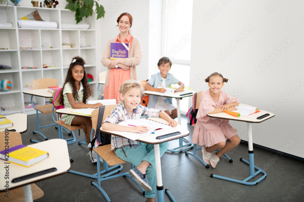 Children feeling excited before having first English class Children feeling excited before having first English class