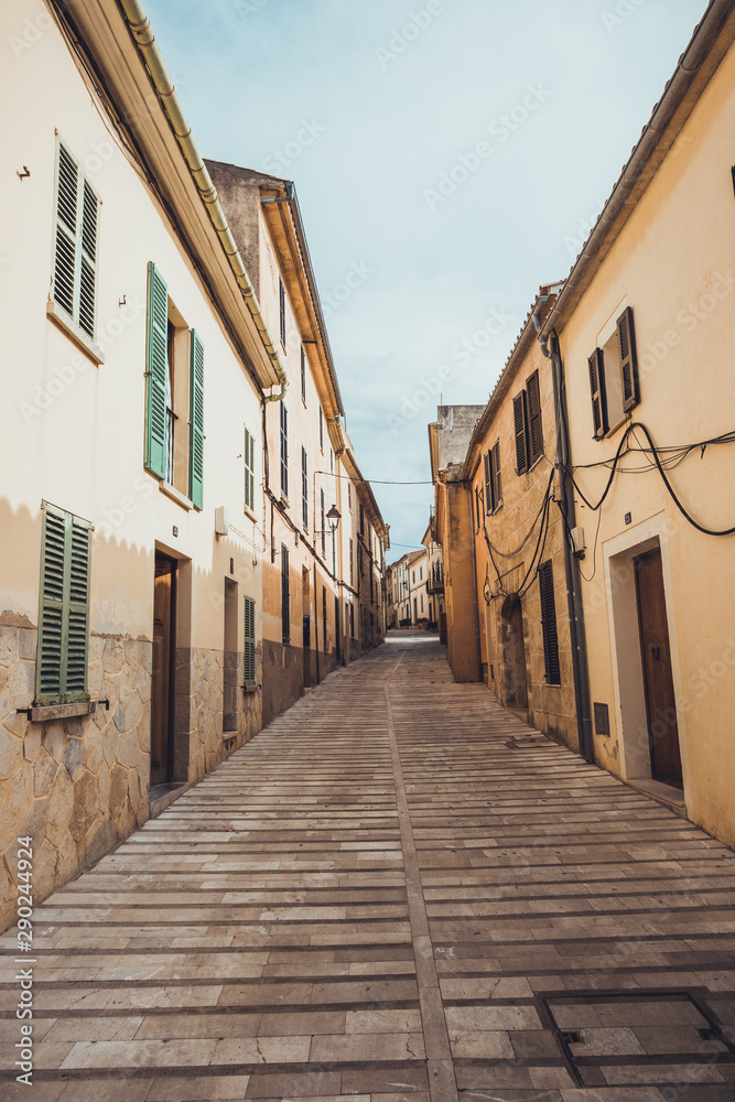 lone street at majorca in warm colors