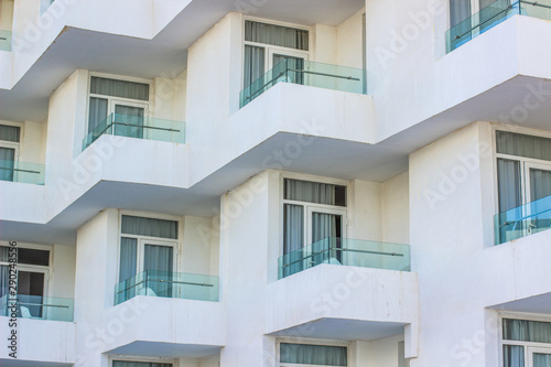 motel white building dirty walls and perspective windows balcony terraces exterior facade background © Артём Князь