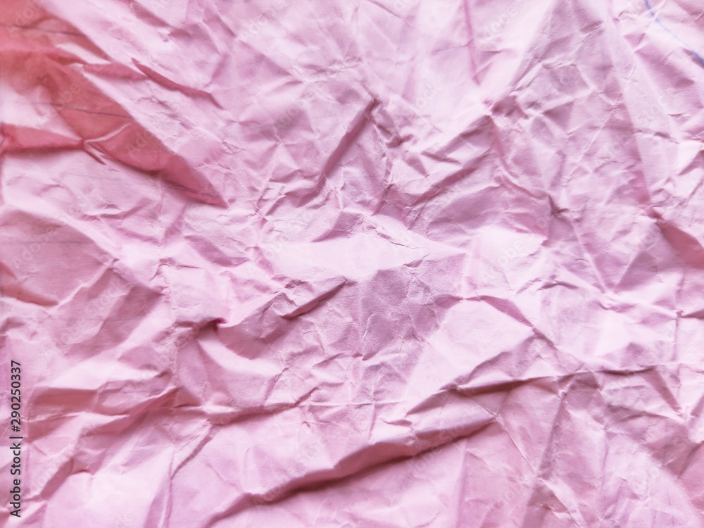 Fototapeta premium Crumpled pink paper pattern background.
