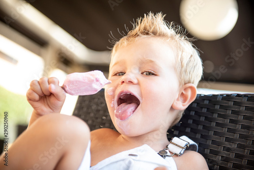 Lovely baby eating ice cream