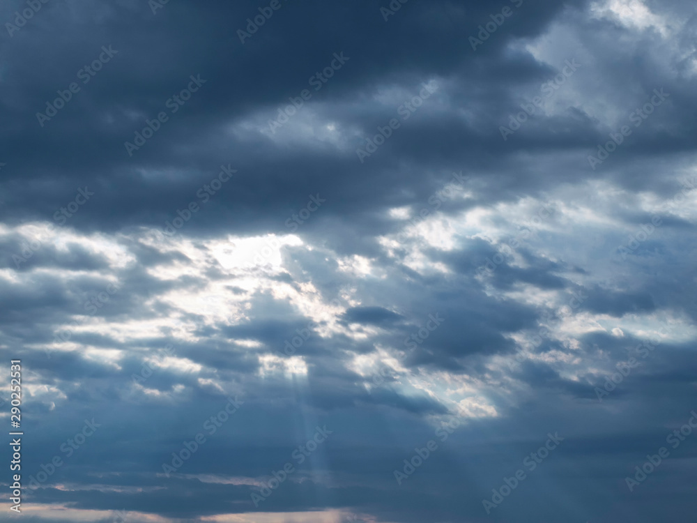 Sunbeams break through the clouds in the morning. Dramatic morning sky Sunbeams break through the clouds in the morning. Dramatic morning sky