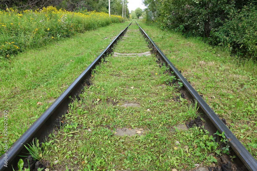 Old abandoned railway among the grass. Russia Old abandoned railway among the grass. Russia
