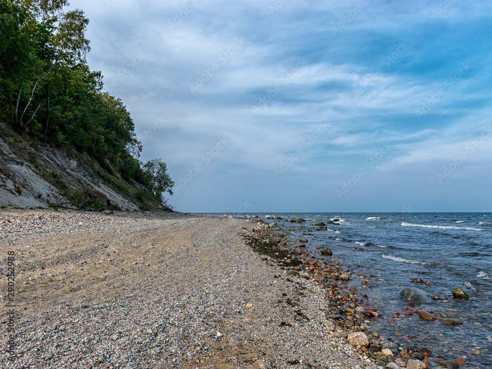 the steep bank, sandstone outcrops in the shallow Baltic Sea coast, Zelenogradsk, Russia the steep bank, sandstone outcrops in the shallow Baltic Sea coast, Zelenogradsk, Russia