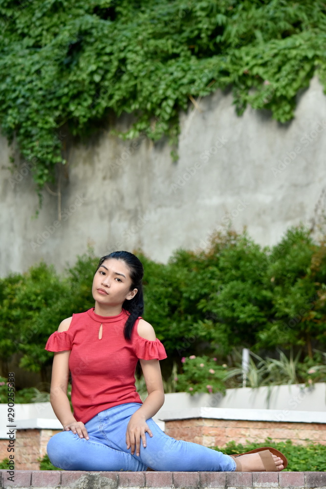 Naklejka premium A Cute Diverse Female Sitting