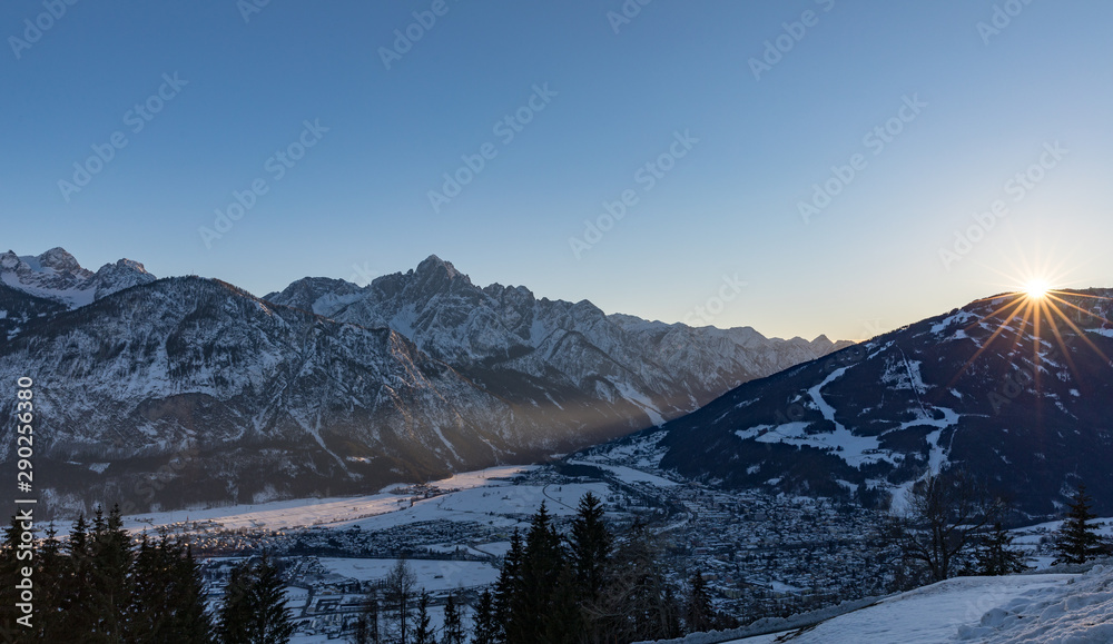 Beautiful view of the city of Lienz in Osttirol, Austria, in the Austrian alps, on a beautiful winter afternoon close to sunset.