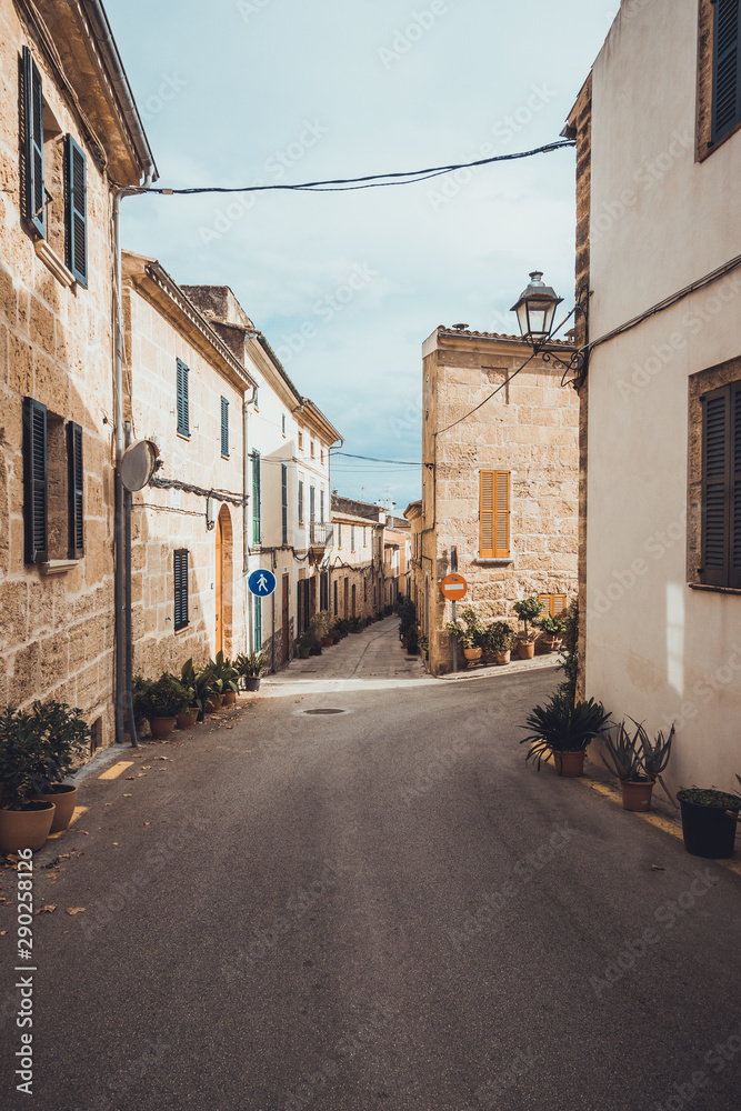 lone street at majorca in warm colors