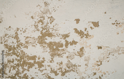 A highly detailed cracked painted wall background and texture. © Dima