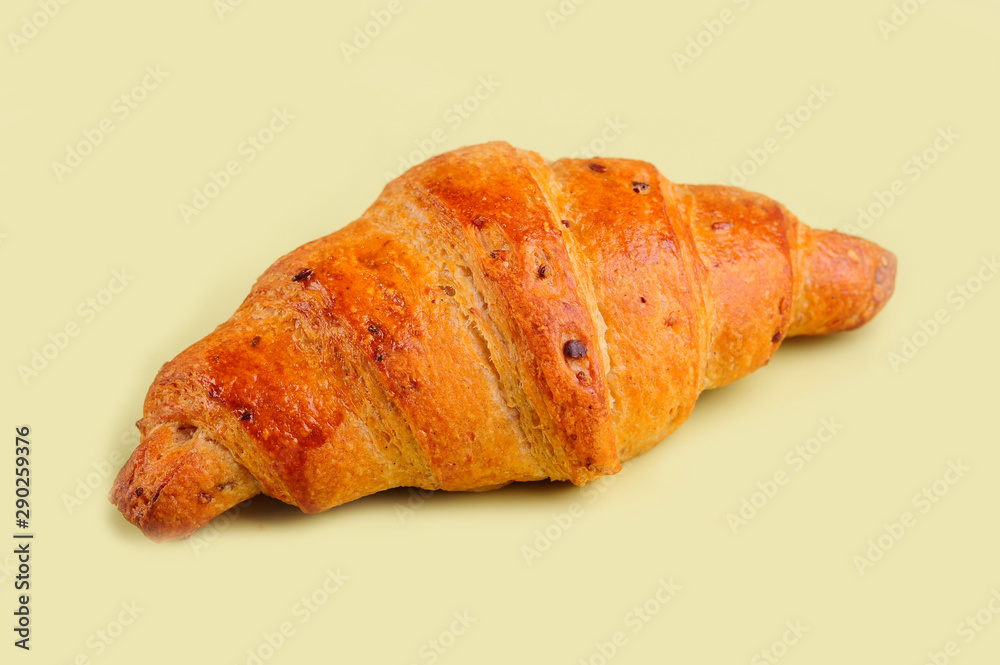 Croissant on yellow board. Croissant on yellow board.