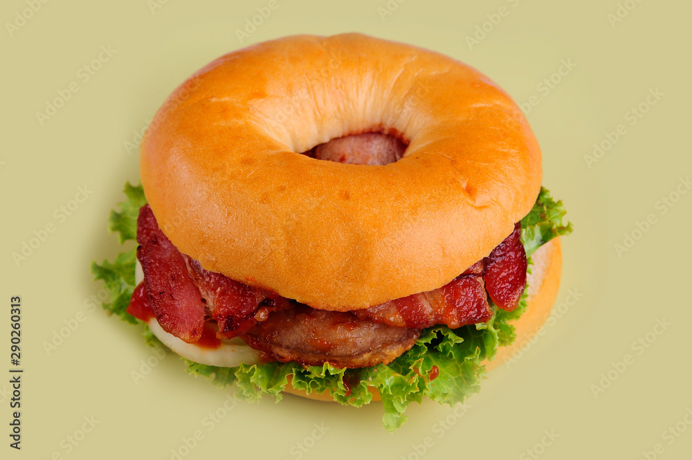 fresh tasty burger isolated on yellow background