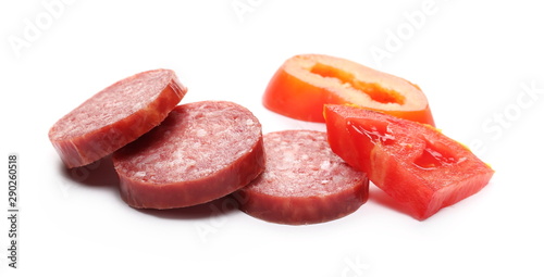 Fermented semi-dry, smoked sausage salami with tomato slice, isolated on white background