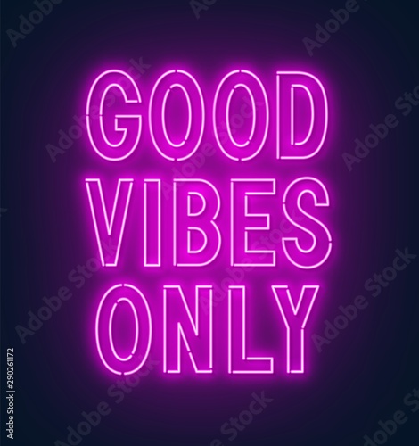 Neon sign good vibes only on a dark background .
