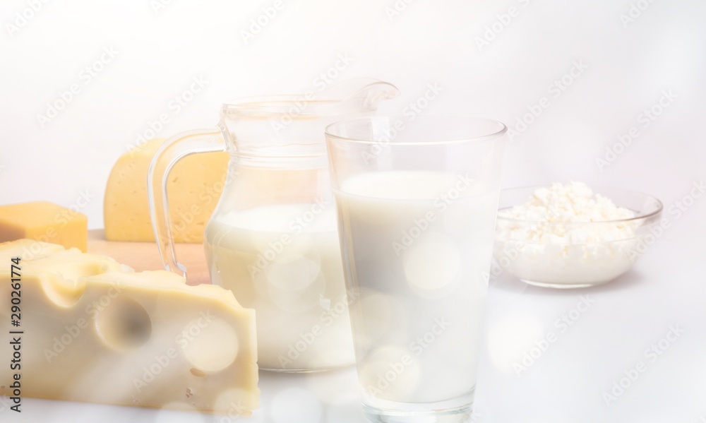 Dairy Products- Cheeses and Milk on the Grey Background Dairy Products- Cheeses and Milk on the Grey Background