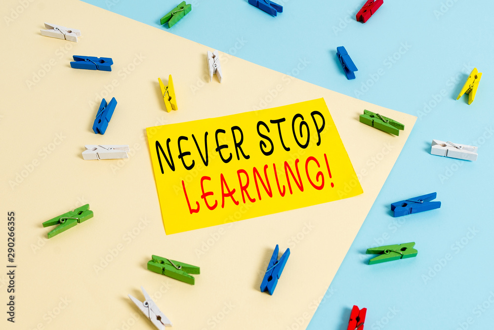 Text sign showing Never Stop Learning. Business photo text keep on studying gaining new knowledge or materials Colored clothespin paper empty reminder yellow blue floor background office Text sign showing Never Stop Learning. Business photo text keep on studying gaining new knowledge or materials Colored clothespin paper empty reminder yellow blue floor background office