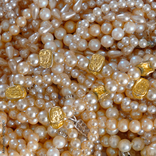 precious pearls top view closeup, shiny background