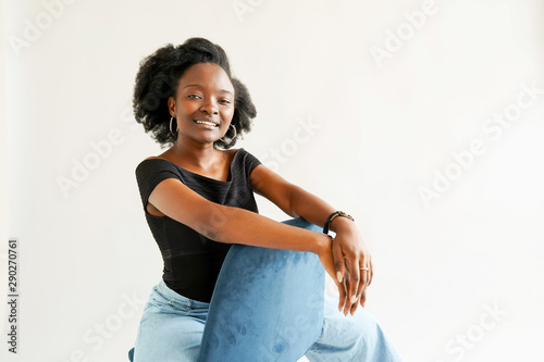 Schilderij op canvas Portrait of young African American woman isolated over white background