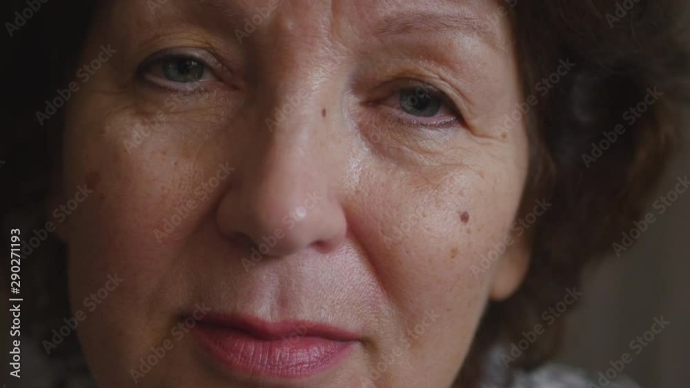 Portrait Of A Elderly Woman Face Looking At Camera . Portrait Of A Elderly Woman Face Looking At Camera .