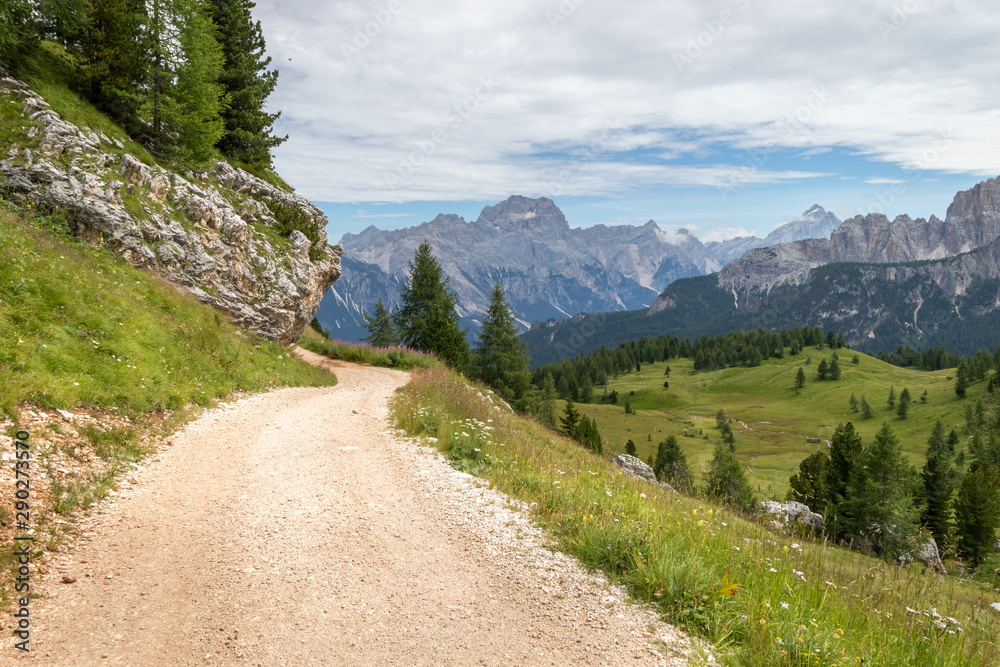 Obraz premium Road to the summit in Italian Mountains near Cortina de Ampezzo town. Dolomite Alps in Italy