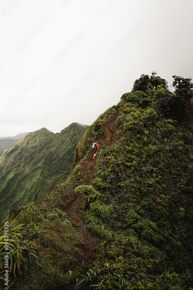 Dramatic views over Kaneohe hiking the Stairway to Heaven (Haiku Stairs) Oahu, Hawaii. Dramatic views over Kaneohe hiking the Stairway to Heaven (Haiku Stairs) Oahu, Hawaii.