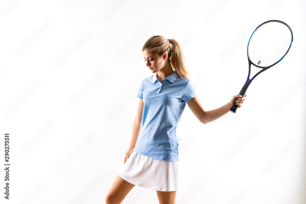 Teenager tennis player girl over isolated white background