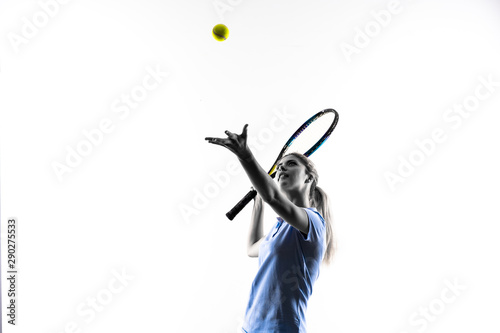 Teenager tennis player girl over isolated white background © luismolinero