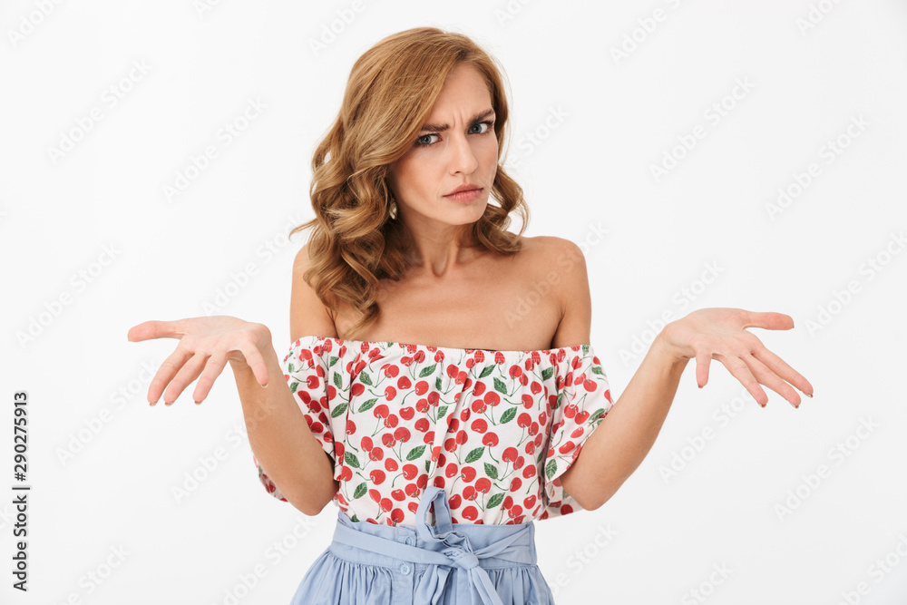 Confused woman posing isolated over white wall background. Confused woman posing isolated over white wall background.