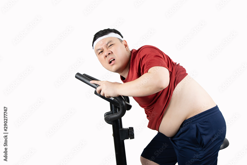 Young happy Asian fat man with a big belly in red sportswear smiling and exercising with sport equipment, isolated on white background with copy space. Body shape, weight loss and healthy concept. Young happy Asian fat man with a big belly in red sportswear smiling and exercising with sport equipment, isolated on white background with copy space. Body shape, weight loss and healthy concept.