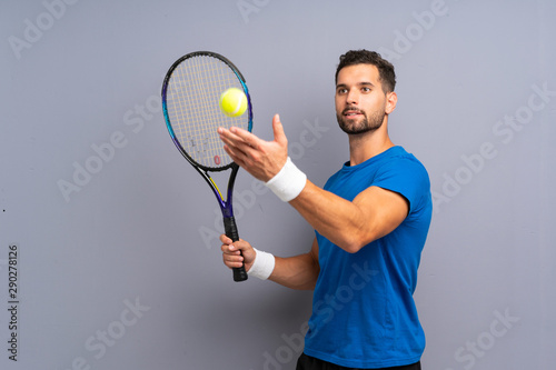 Handsome young tennis player man © luismolinero