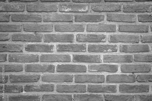 Abstract Wall black brick wall texture background pattern, brick surface backgrounds. Vintage Brickwork or stonework flooring interior rock old clean concrete grid uneven.