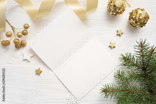 Christmas background for greeting card sheet of paper with place for text. xmas wooden background. Flat lay, top view photo mockup