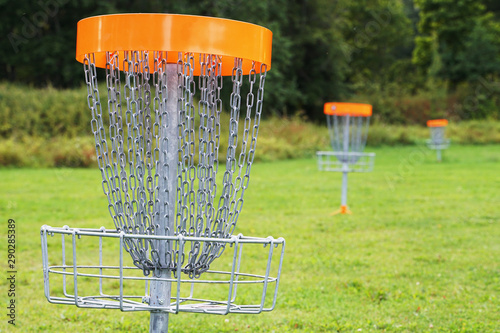 фотографія Disc golf basket in the park.