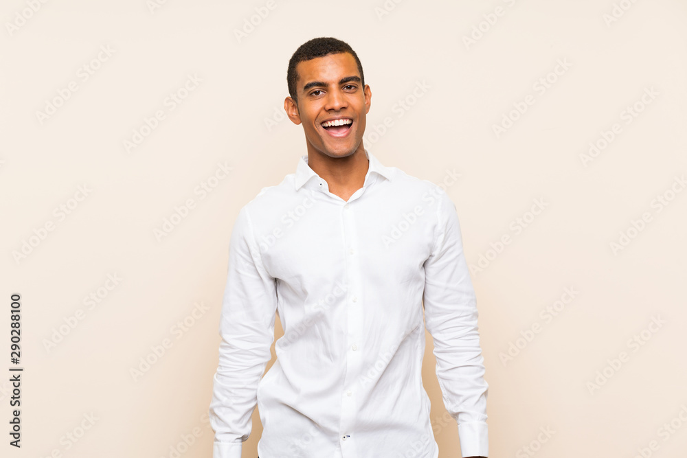 Young handsome brunette man over isolated background with surprise facial expression Young handsome brunette man over isolated background with surprise facial expression