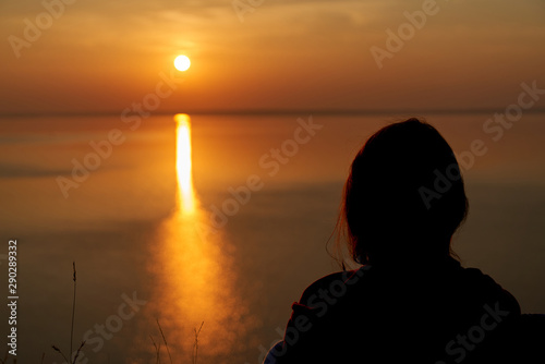 Dawn early in morning over wide long Volga river