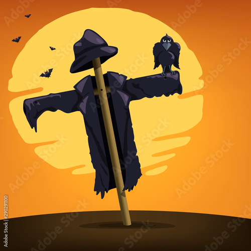 Raven perching on a scarecrow