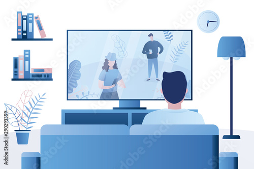 Man sits on the couch and watches TV,male character back view,living room interior,