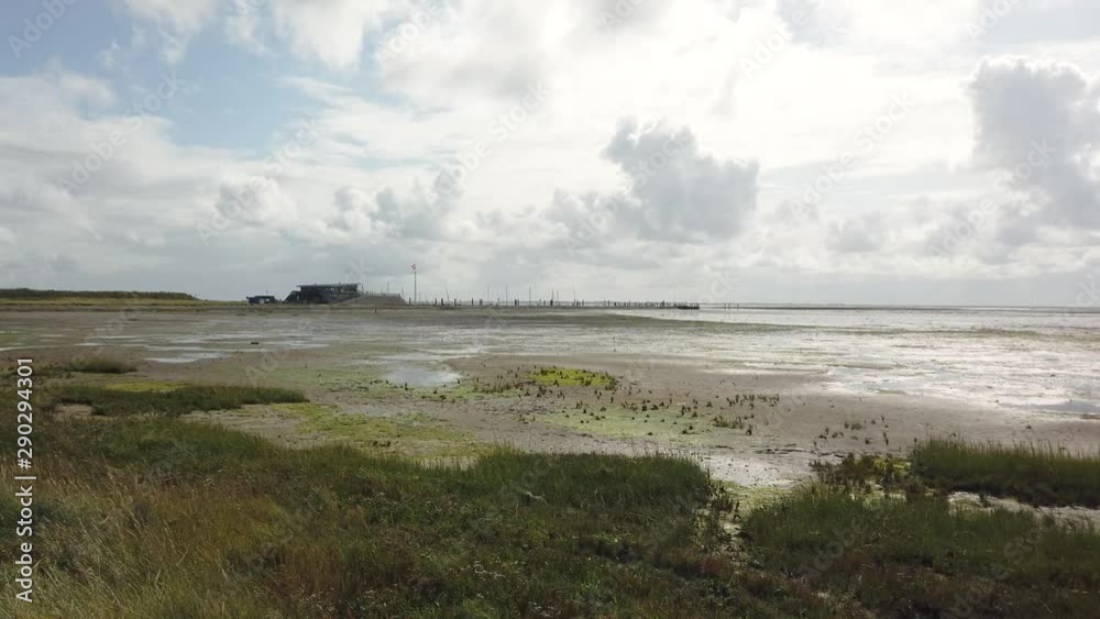 Schiermonnikoog Harbor and Wadden sea at low tide Schiermonnikoog Harbor and Wadden sea at low tide