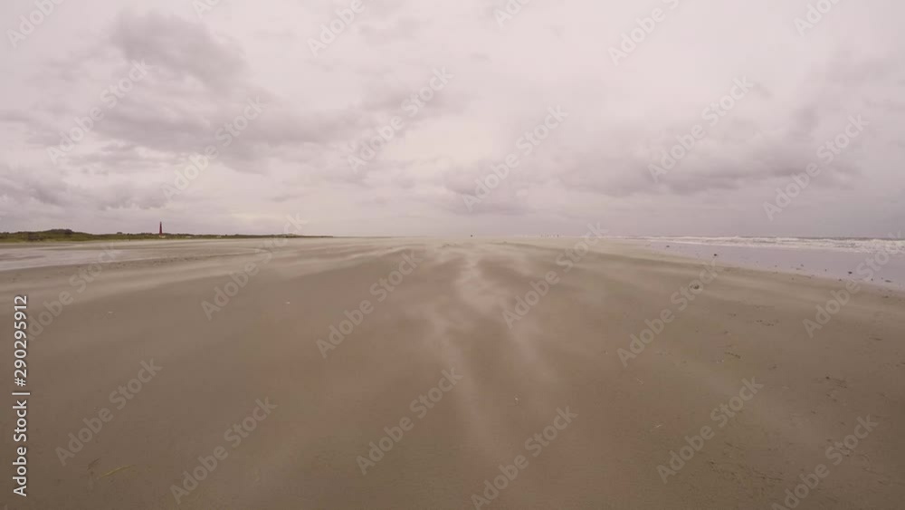 Sand storm at Schiermonnikoog Beach in the Netherlands Sand storm at Schiermonnikoog Beach in the Netherlands