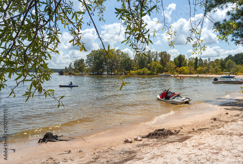 People enjoying Calm waters on a sunny day at the Jordan Lake in North Carolina, USA